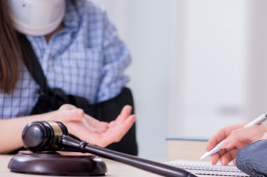 Injury Claim: Injured Person, Gavel, Notes