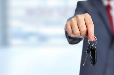 A person holding car keys, symbolizing legal support after car accident claims in Georgia.