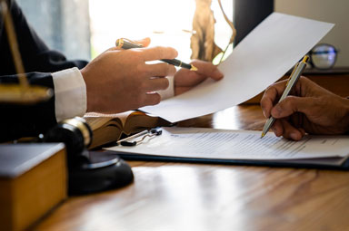 Lawyers discussing statute of limitations in a professional office setting.