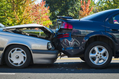 Two cars collided in Georgia accident, illustrating contributing factors to traffic crashes.