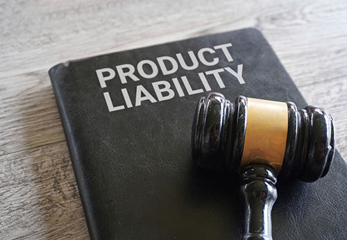 Gavel resting on a black book labeled "PRODUCT LIABILITY."
