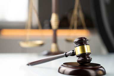 Gavel and scales highlighting Georgia personal injury case settlement timelines.
